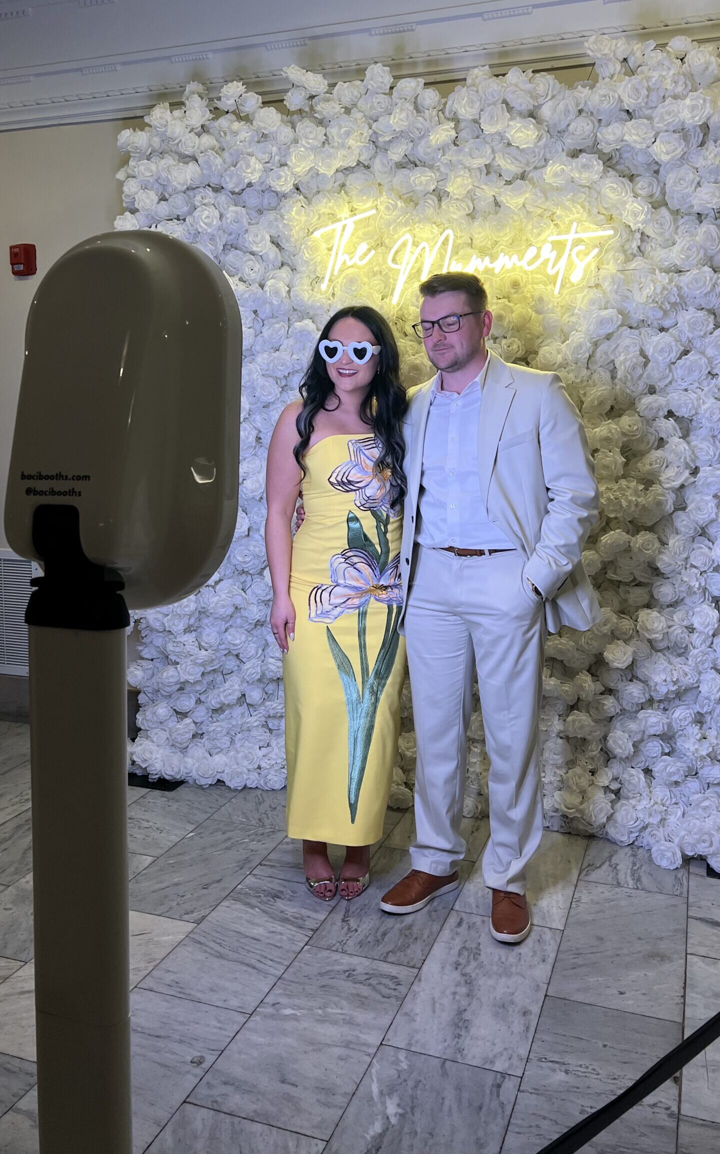 Couple using Clic photo booth at a wedding